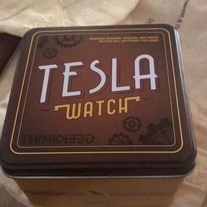 Tesla watch, still in box, never used